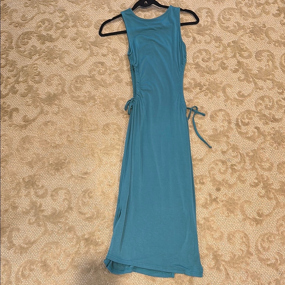Light green midi dress with cut outs on side